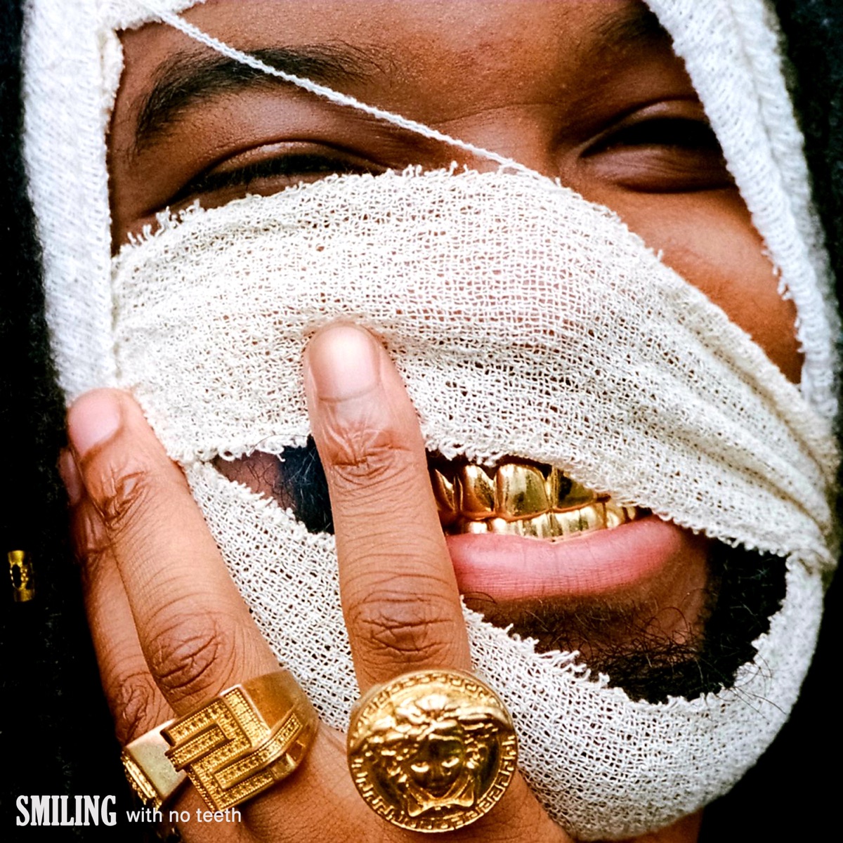 Smiling With No Teeth by Genesis Owusu